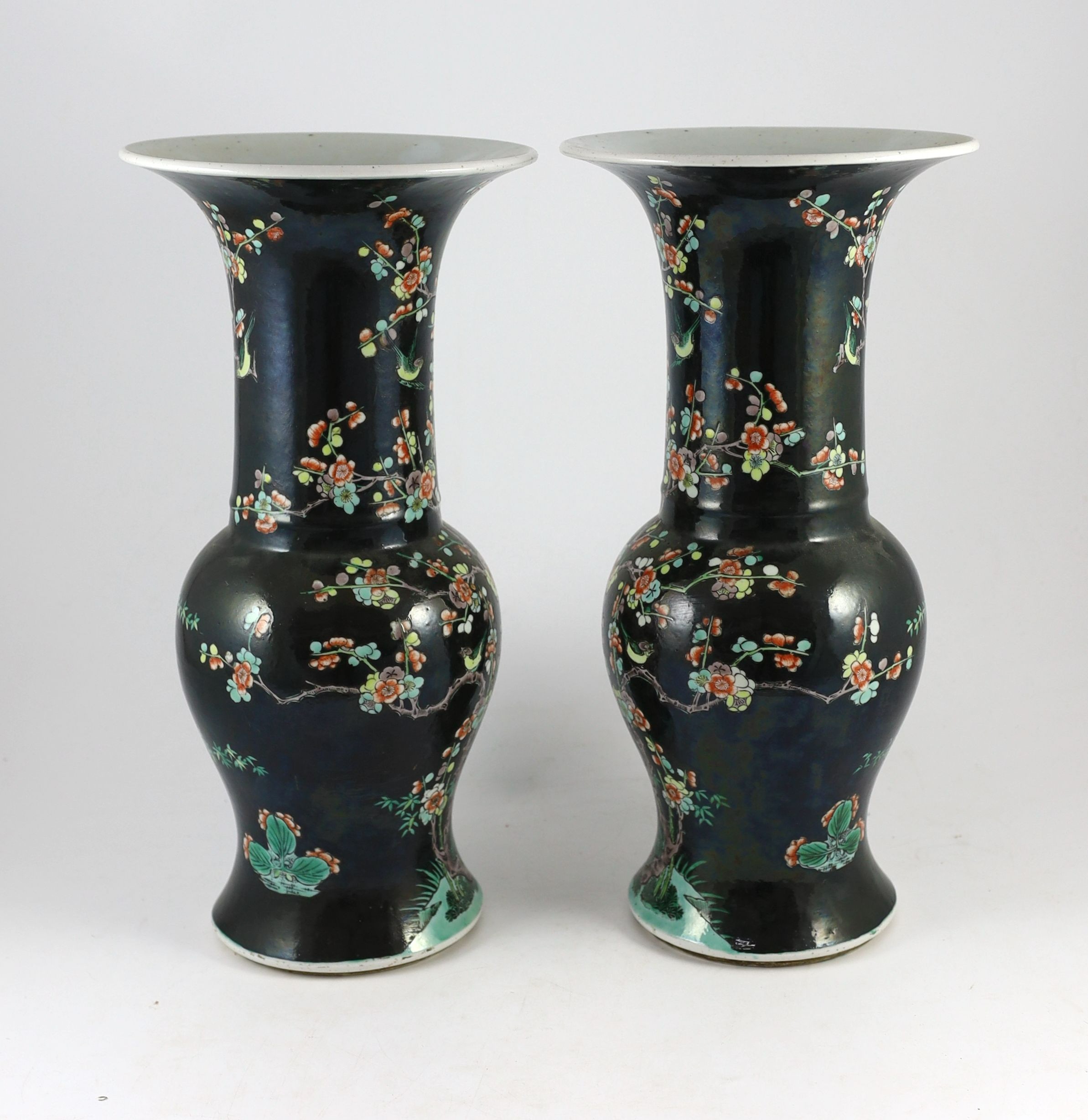 A pair of large Chinese famille noire yen-yen vases, six character Kangxi marks but 19th century, 44 cm high